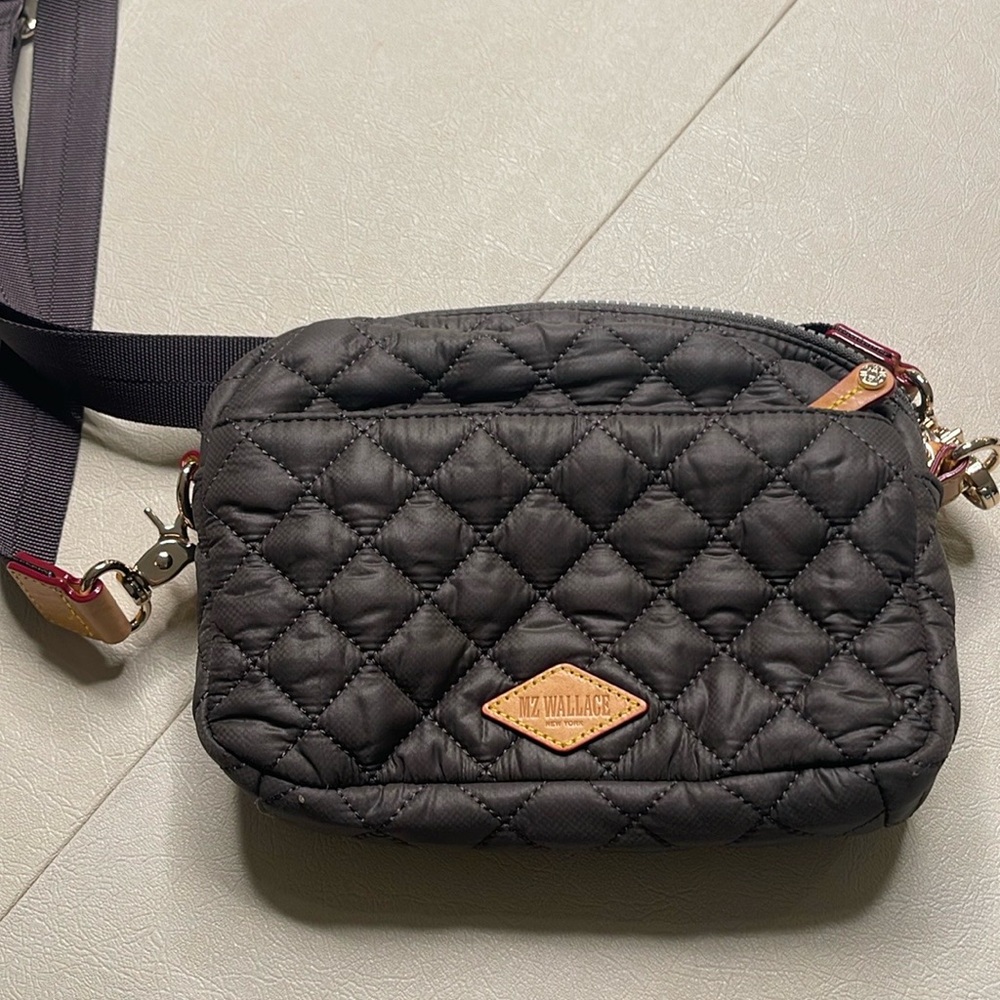 Almost new MZ Wallace cross body.  Brownish charcoal in color.